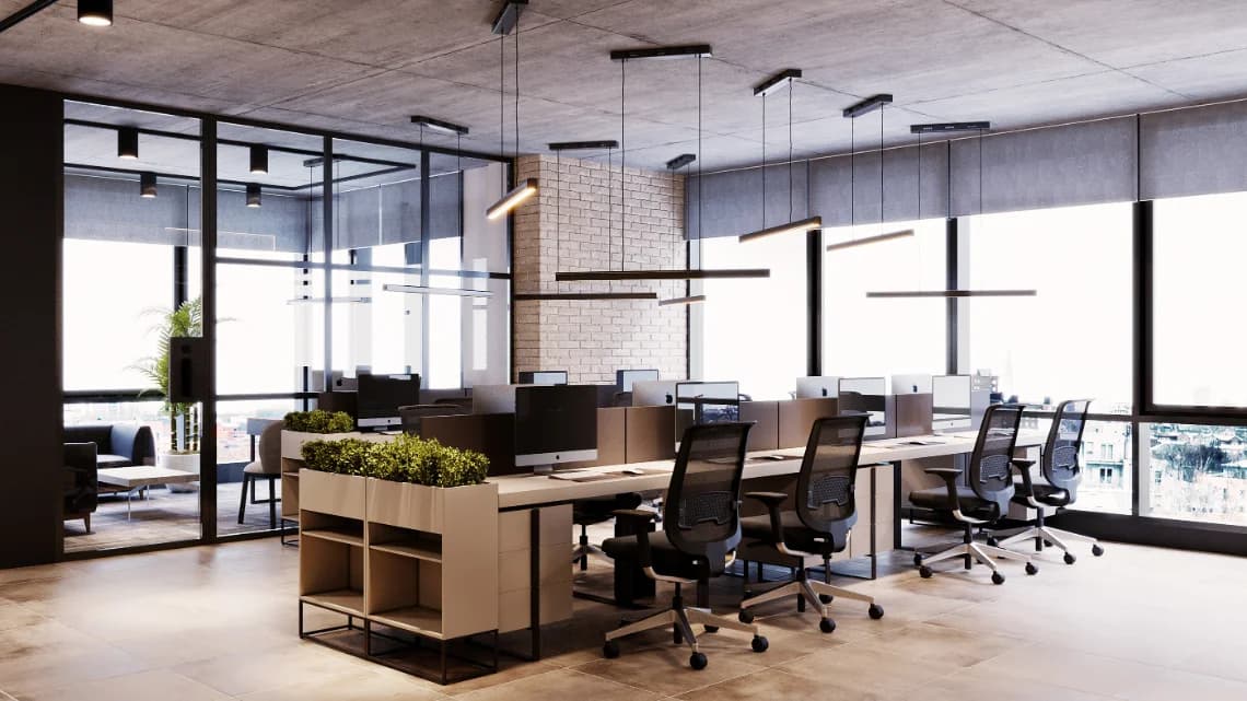 Open-plan office with the workstations where ChatBuild is built